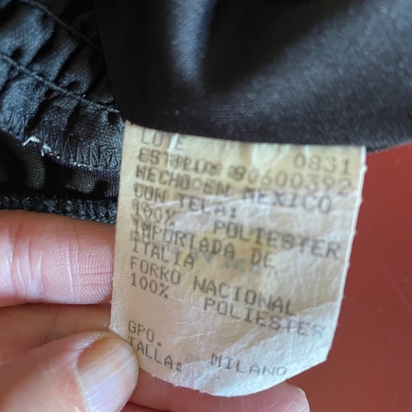 Elegant Black and White Halter-Top Jumpsuit with Ruffled Detail - Picture 13 of 16